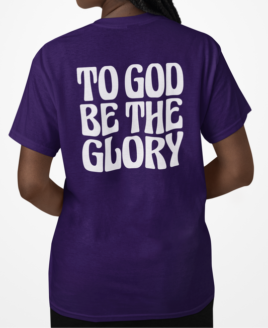 Woman wearing a purple t-shirt with 'TO GOD BE THE GLORY' in white text