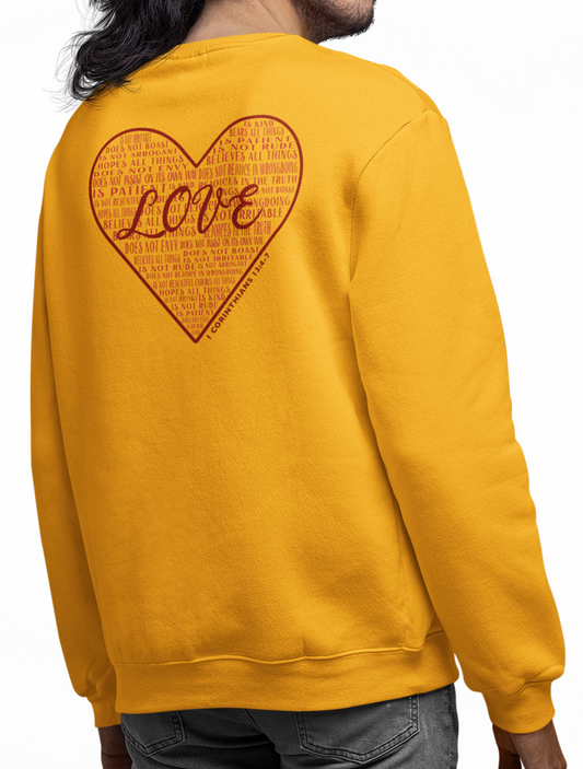 Man wearing a gold sweatshirt with a red heart design with scripture verses inside on the back