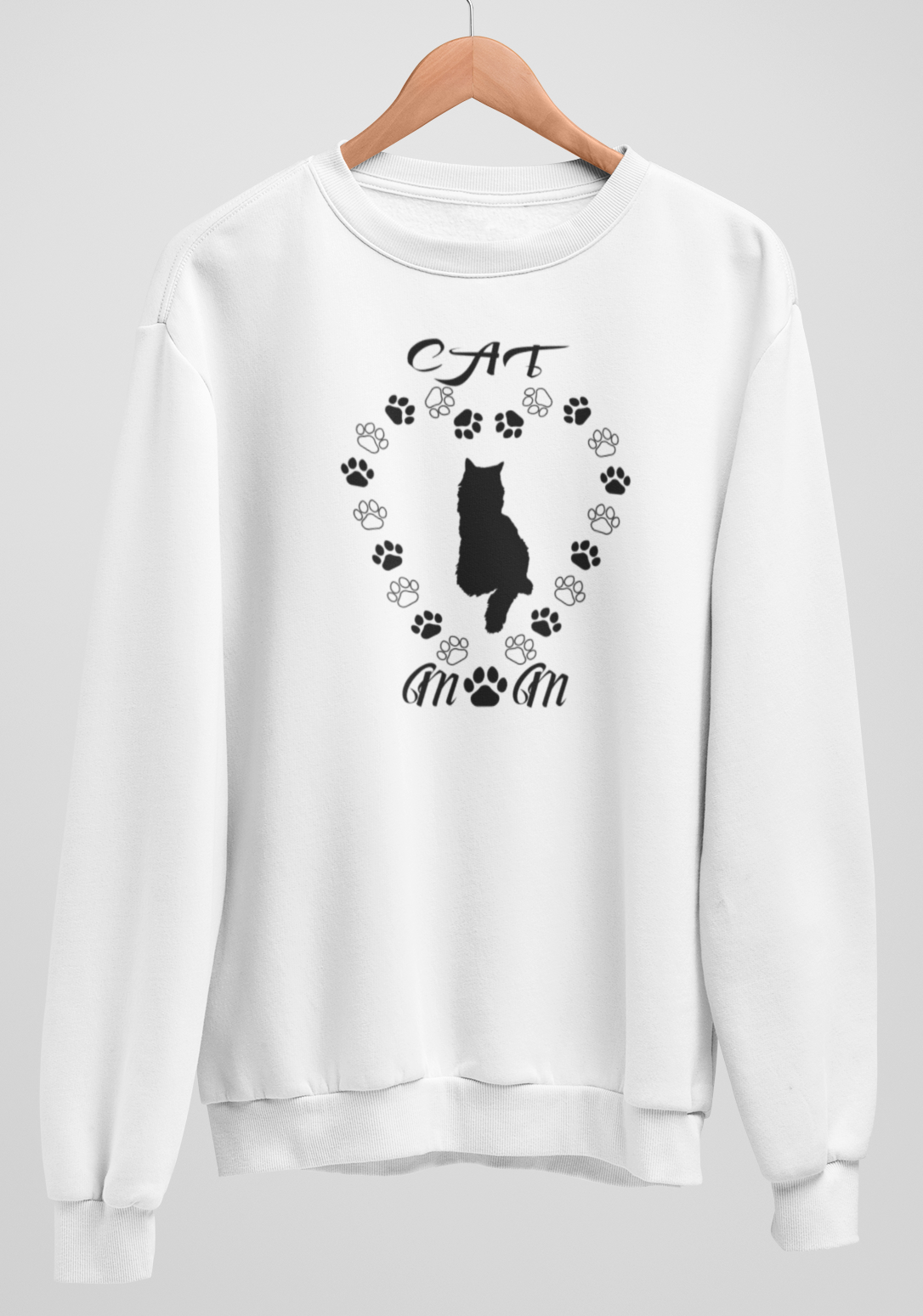 White sweatshirt with a black cat design on a hanger against a white background