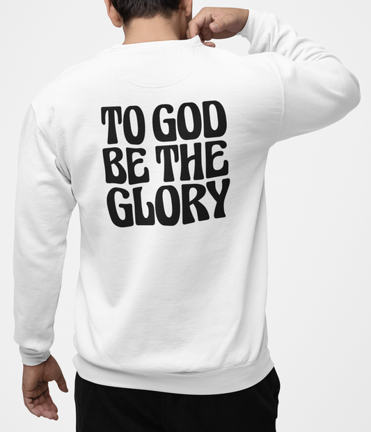 Man wearing a white sweatshirt with 'TO GOD BE THE GLORY' in black text on the back