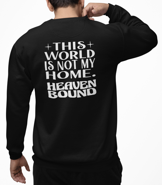 Man wearing a black sweatshirt with white text 'THIS WORLD IS NOT MY HOME HEAVEN BOUND' on the back