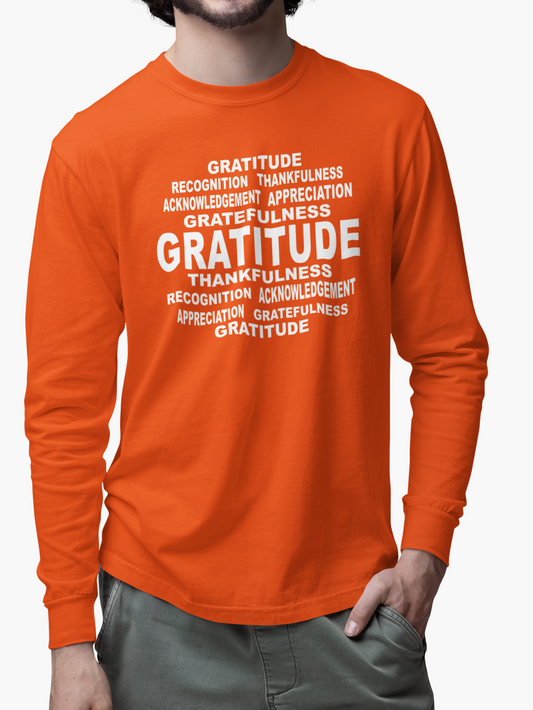 Man wearing an orange long-sleeve shirt with motivational text on a white background