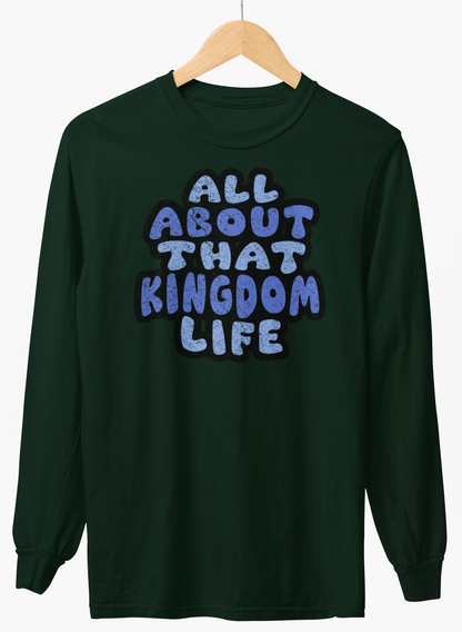 Forest green long-sleeve shirt with 'All About That Kingdom Life' distressed text on a hanger against a white background