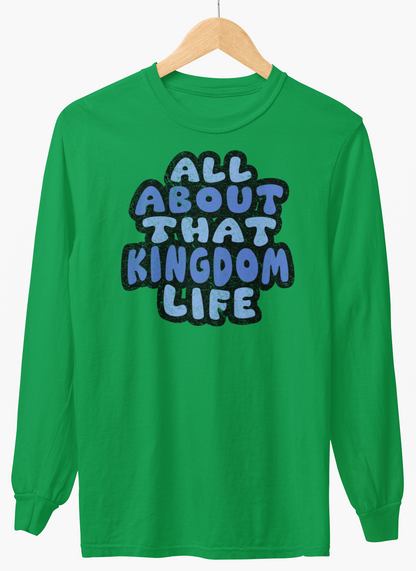 Irish green long-sleeve shirt with 'All About That Kingdom Life' distressed text on a hanger against a white background