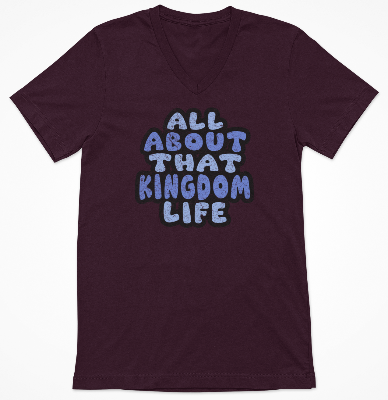 Maroon women's v-neck t-shirt with 'All About That Kingdom Life' distressed text on a white background