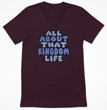 Maroon women's v-neck t-shirt with 'All About That Kingdom Life' distressed text on a white background