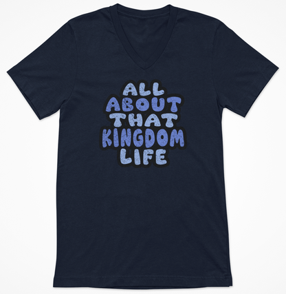 Navy blue women's v-neck t-shirt with 'All About That Kingdom Life' distressed text on a white background