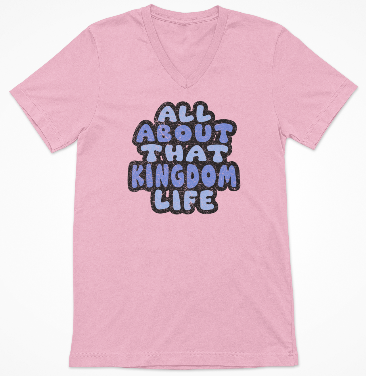 Pink v-neck t-shirt with 'All About That Kingdom Life' distressed text on a white background