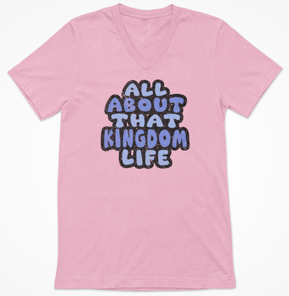 Pink v-neck t-shirt with 'All About That Kingdom Life' distressed text on a white background