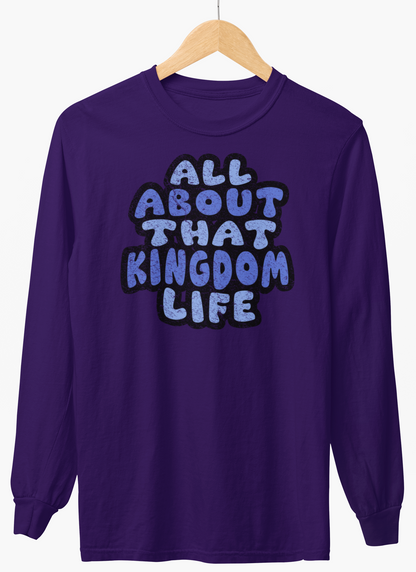 Purple long-sleeve shirt with 'All About That Kingdom Life' distressed text on a hanger against a white background