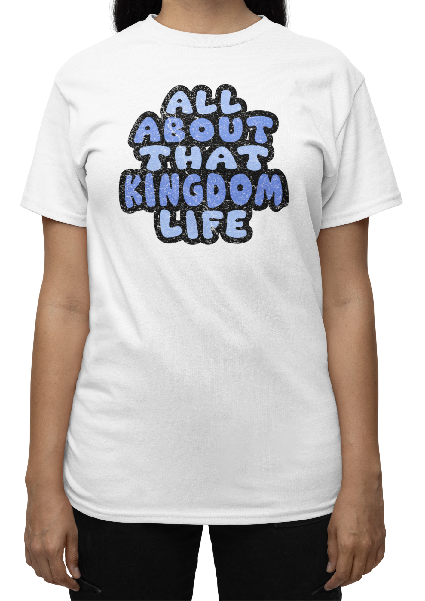 White t-shirt with 'All About That Kingdom Life' distressed text worn by a person on a white background