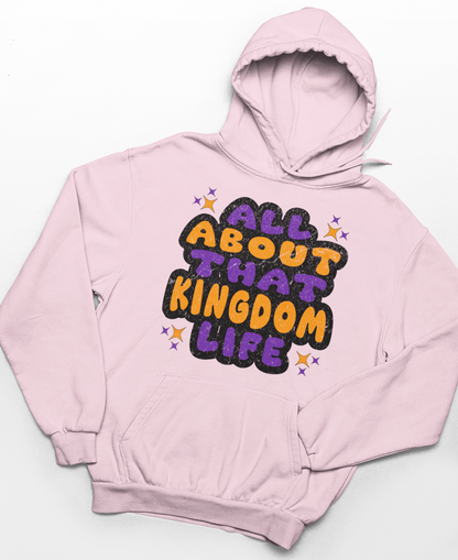 Light pink hoodie with distressed orange and purple text 'All About That Kingdom Life' on a white background