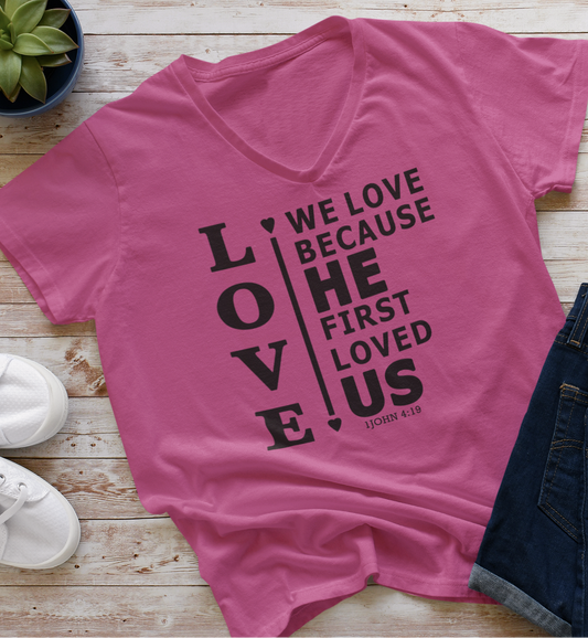 Berry women's v-neck t-shirt with black text from scripture verse 1 John 4:19